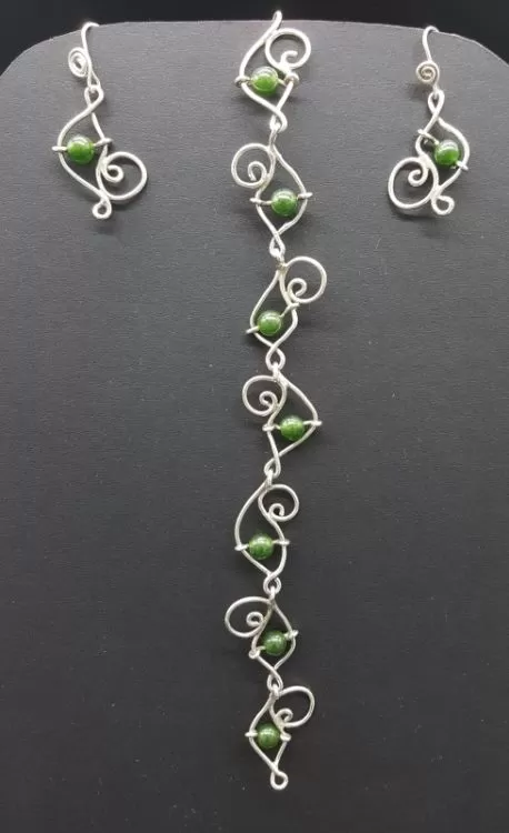  Juego de pulsera y aretes 