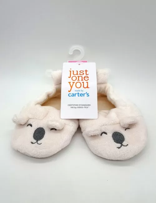 Zapatitos para recién nacido marca Carter's. 